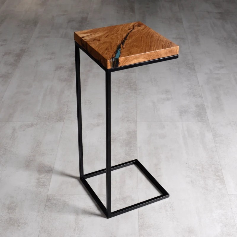 Buy the Live Edge Blue Epoxy Resin C Table to keep essentials close at hand while adding a striking resin-and-wood accent to your living space.